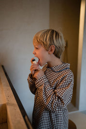 young-boy-using-kids-am-vitamin-spray-in-bathroom